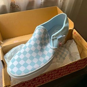 Brand new pair of baby blue checkered slip on Vans